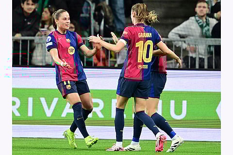 Women's Champions League: Barcelona's Ewa Pajor, left, celebrates scoring a goal