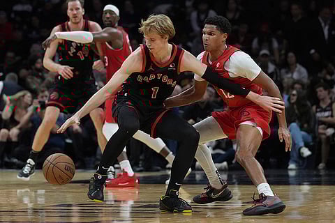 NBA: Raptors guard Gradey Dick goes after a loose ball