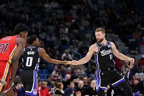 NBA: Domantas Sabonis (11) celebrates his 3-point shot
