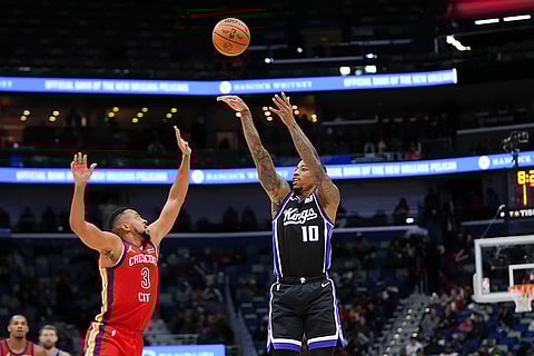 NBA: Kings forward DeMar DeRozan (10) shoots over Pelicans guard CJ McCollum