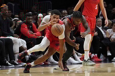 NBA: Raptors guard Davion Mitchell fouls Miami Heat guard Dru Smith