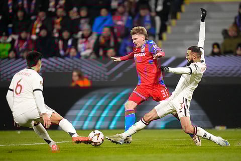 UEFA Europa League: Plzen's Pavel Sulc, centre, challenges for the ball with Man United's Noussair Mazraoui and Lisandro Martinez