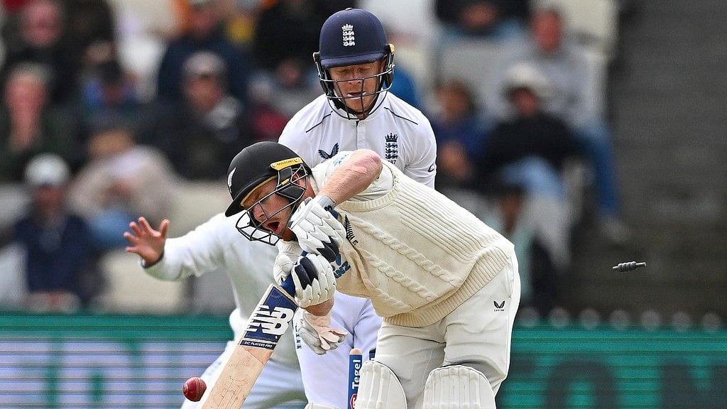 Kerry Marshall/Photosport via AP  : Glenn Phillips reacts after being clean bowled on day three of the second Test between New Zealand and England in Wellington.