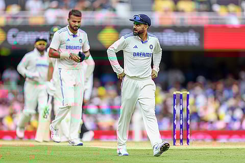 India Vs Australia, 3rd Test Day 1: India's Virat Kohli, right, walks back to his fielding position