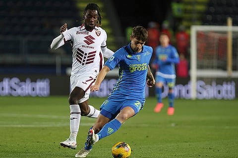 Serie A 2024-25: Empoli's Mattia Viti, right, and Torino's Yann Karamoh in action