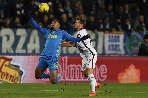 Serie A 2024-25: Torino's Karol Linetty fights for the ball with Empoli's Tino Anjorin