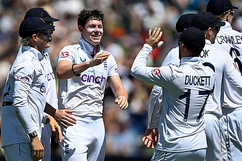 NZ vs ENG 3rd Test Day 1: England bowler Matthew Potts is congratulated by teammates after taking the wicket of New Zealand's Tom Latham