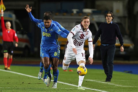 Serie A 2024-25: Torino's Marcus Pedersen and Empoli's Tino Anjorin in action