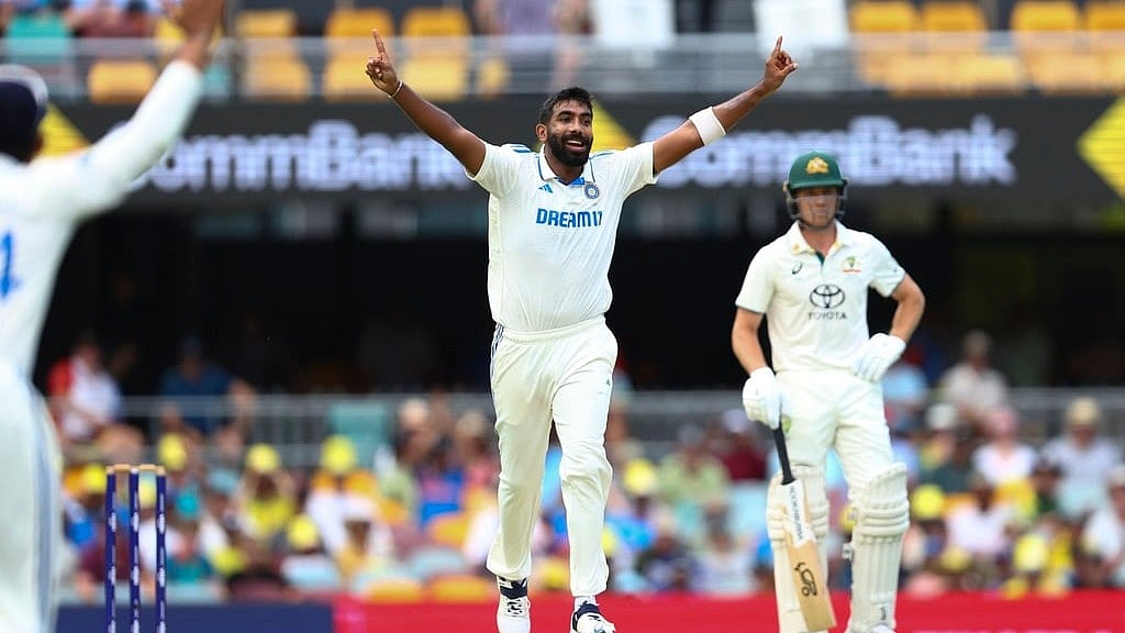 India's Jasprit Bumrah celebrates after taking the wicket off Australia's Usman Khawaja during play on day two of the third cricket test between India and Australia at the Gabba in Brisbane, Australia, Sunday, Dec. 15, 2024.  - AP/Pat Hoelscher