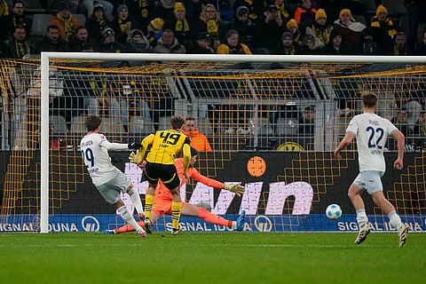 Bundesliga 2024-25: Hoffenheim's Jacob Bruun Larsen, left, scores his side's first goal