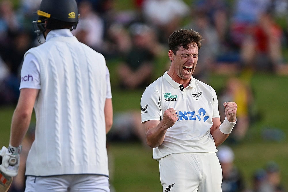 | Photo: Andrew Cornaga/Photosport via AP : NZ vs ENG 3rd Test Day 3: New Zealand's Matt Henry celebrates the wicket of England's Zak Crawley
