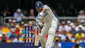 AP : Virat Kohli chasing a delivery during play on day three of the third cricket test between India and Australia at the Gabba in Brisbane, Australia, Monday, Dec. 16, 2024.