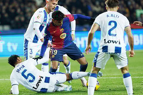 La liga 2024-25: Barcelona's Lamine Yamal and Leganes' Renato Tapia challenge for the ball