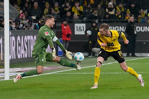 Bundesliga 2024-25: Hoffenheim's goalkeeper Oliver Baumann blocks Dortmund's Maximilian Beier