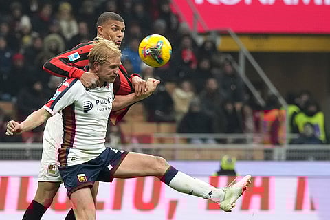 Serie A 2024-25: Genoa's Morten Thorsby challenges for the ball with AC Milan's Malick Thiaw