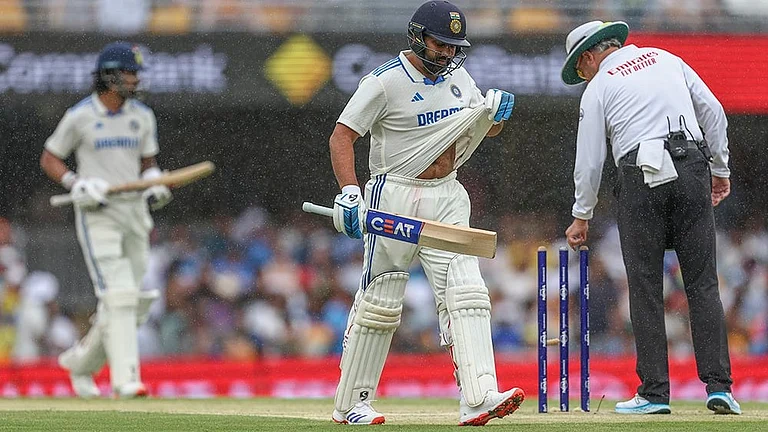India Vs Australia, 3rd Test Day 3: India's captain Rohit Sharma and KL Rahul leaves the field as rain stops play - | Photo: AP/Pat Hoelscher