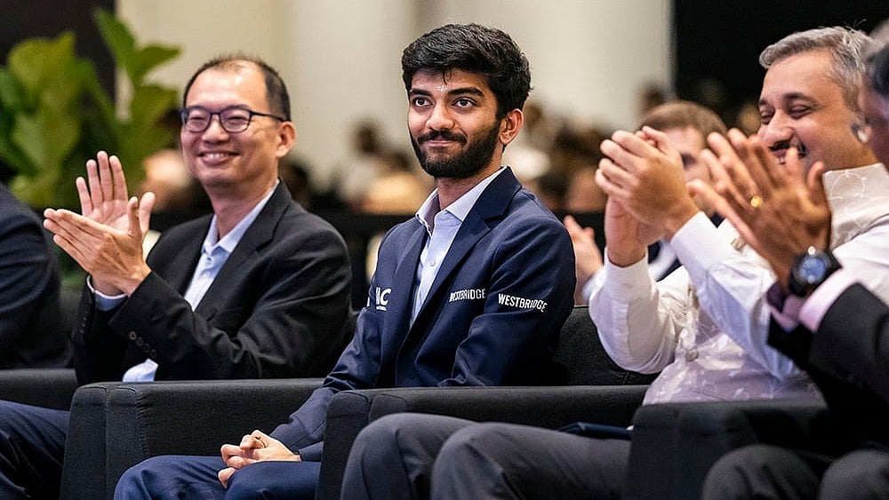 | Photo: FIDE/Eng Chin An via PTI  : World Chess Championship 2024: D Gukesh reacts during the Closing Ceremony 