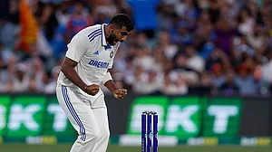 | Photo: AP/James Elsby : India's Jasprit Bumrah celebrates.