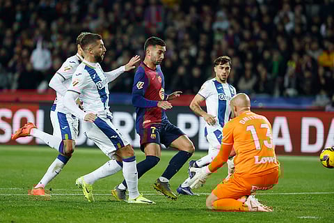 La liga 2024-25: Barcelona's Ferran Torres and Leganes' goalkeeper Marko Dmitrovic challenge for the ball