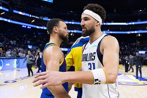 NBA 2024-25: Warriors guard Stephen Curry interacts with Mavericks guard Klay Thompson