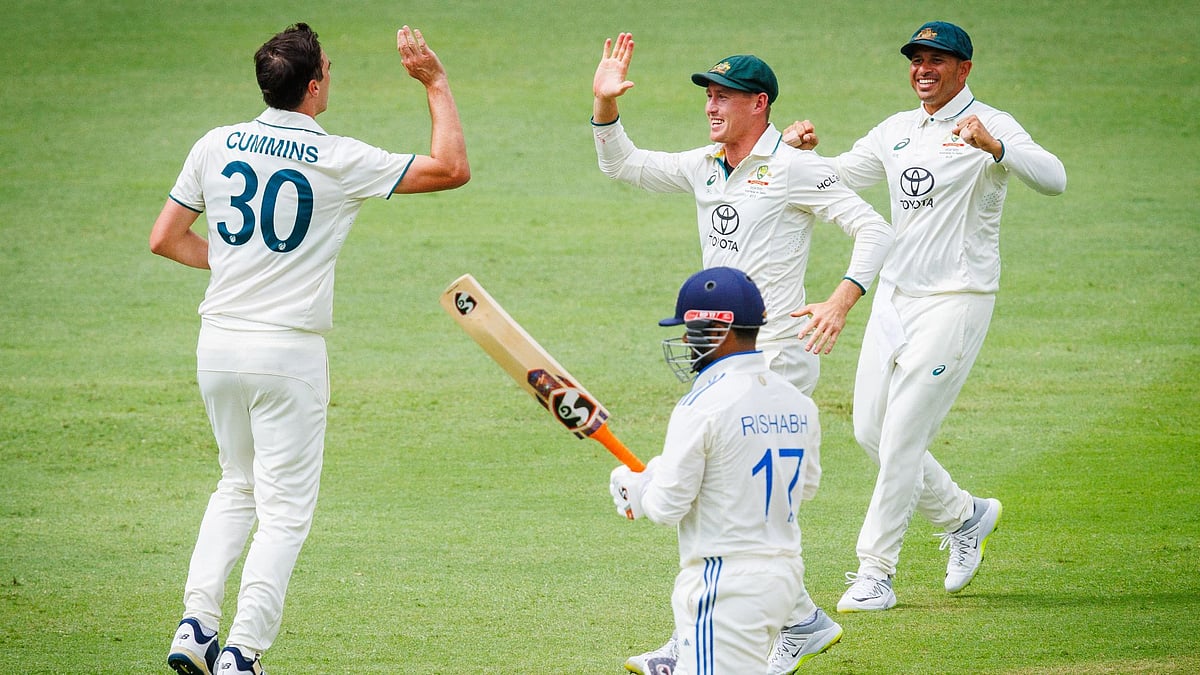 Australia celebrate claiming the wicket of Rohit Sharma