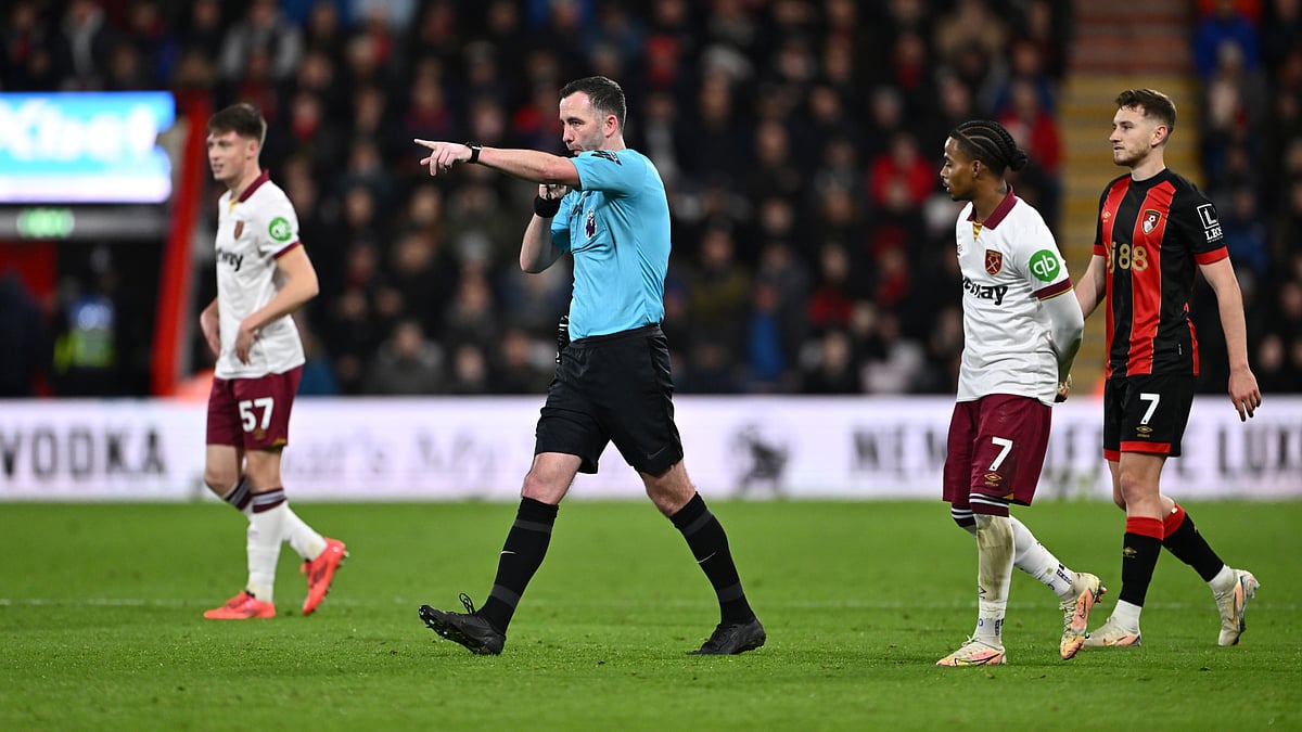 Referee Chris Kavanagh awards a penalty to West Ham.
