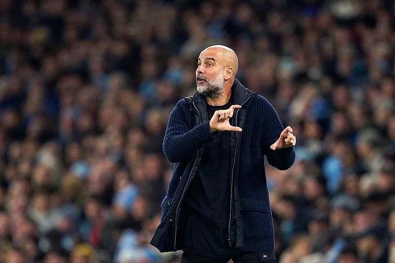 English Premier League Soccer Man City Vs Man United football match pics: Pep Guardiola