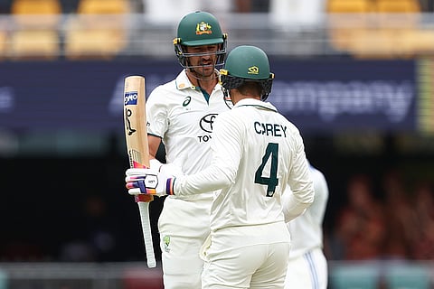 India Vs Australia, 3rd Test Day 3: Australia's Alex Carey is congratulated by teammate Mitchell Starc after scoring 50 runs