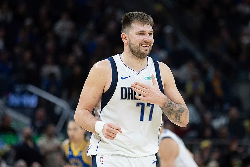 NBA 2024-25 Golden State Warriors vs Dallas Mavericks basketball game photos: Luka Doncic