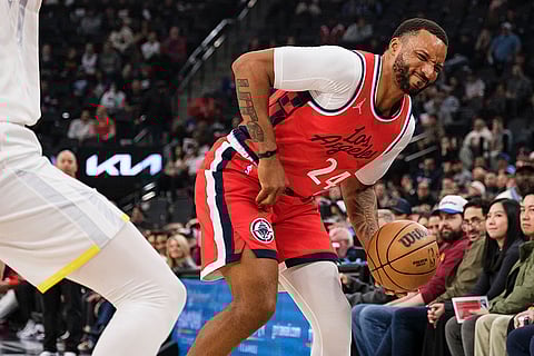 NBA 2024-25: Clippers guard Norman Powell (24) reacts after hitting his hand 