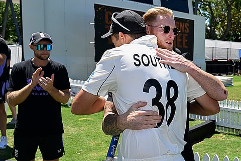 New Zealand's Tim Southee is embraced by England captain Ben Strokes.