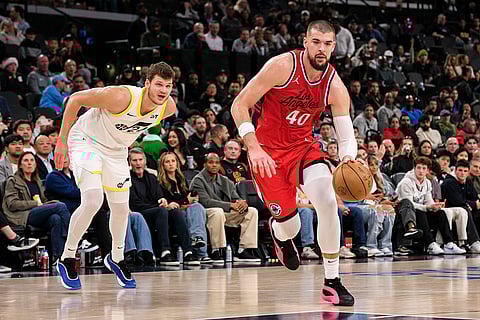 NBA 2024-25: Clippers center Ivica Zubac (40) drives the ball past Jazz center Walker Kessler