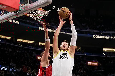 NBA 2024-25: Jazz center Walker Kessler (24) rebounds the ball against Clippers center Ivica Zubac