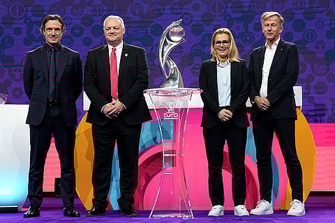 Women's Euro 2025 Draw: Laurent Bonadei (L), a representative of Wales, Sarina Wiegman (2R) and Andries Jonker(R)