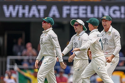 India Vs Australia, 3rd Test Day 4: Steve Smith of Australia celebrates with his teammates following KL Rahul of India's dismissal.