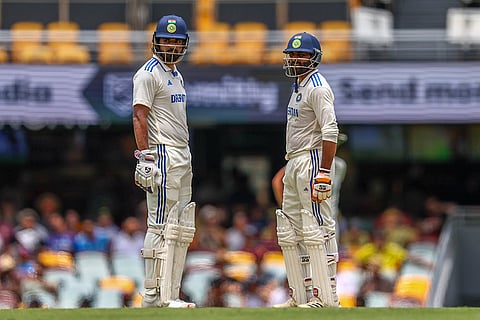 India Vs Australia, 3rd Test Day 4: India's KL Rahul, left, and his batting partner looks on during play