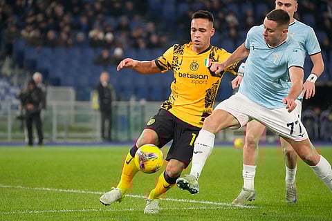 Serie A 2024-25: nter Milan's Lautaro Martinez challenges for the ball with Lazio's Adam Marusic