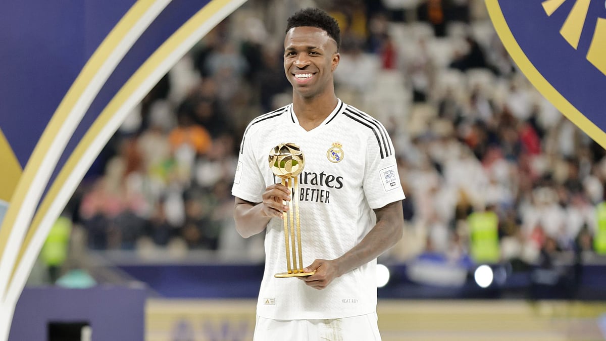 Vinicius with the Golden Ball trophy after Madrid's Intercontinental Cup win over Pachuca - null
