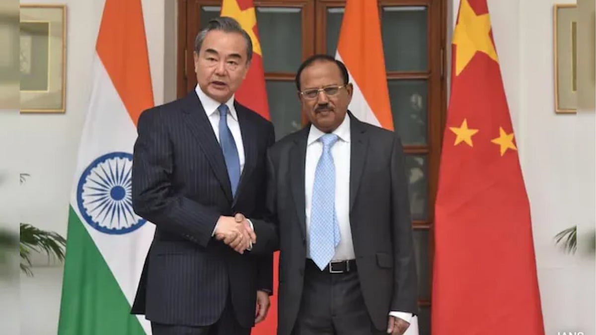 | Photo: IANS : Wang Yi and Ajit Doval