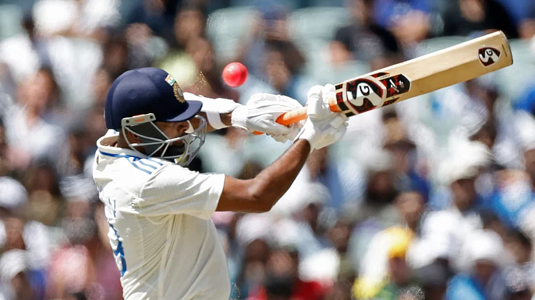 India's Ravichandran Ashwin plays a shot to be caught behind by Australia's wicketkeeper Alex Carey during day three of the second cricket test match between Australia and India at the Adelaide Oval in Adelaide. - AP Photo/James Elsby