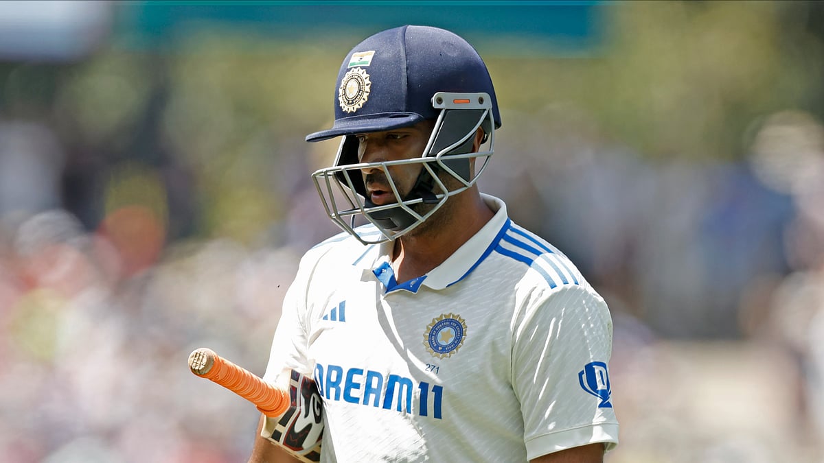 AP Photo/James Elsby : India's Ravichandran Ashwin walks off the field after losing his wicket during day three of the second cricket test match between Australia and India at the Adelaide Oval in Adelaide.