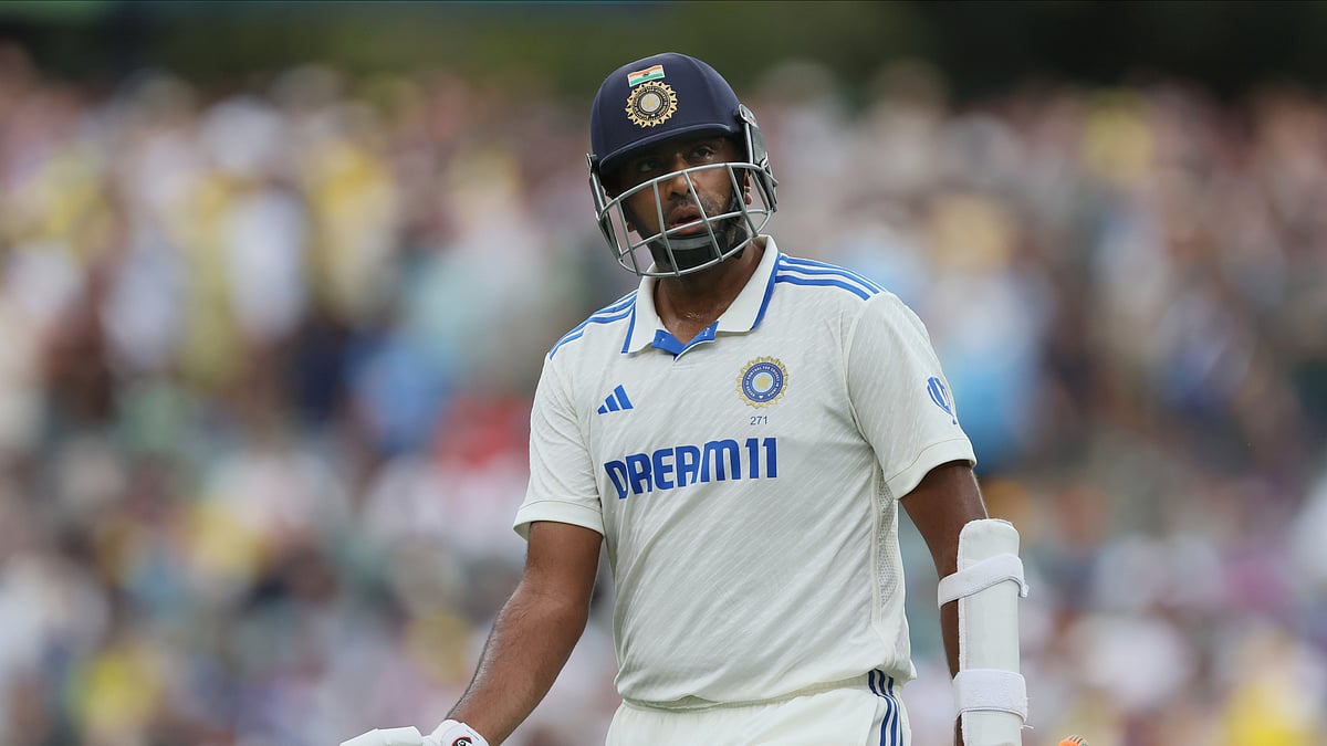 AP Photo/James Elsby : India's Ravichandran Ashwin walks off the field after losing his wicket during day one of the second cricket test match between Australia and India at the Adelaide Oval in Adelaide.