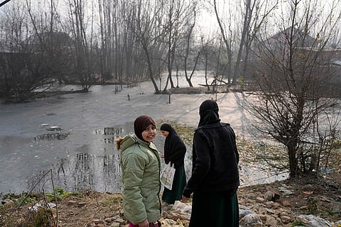 Cold wave in Kashmir valley: Frozen surface of water in the interior of Dal Lake