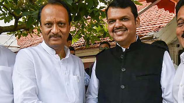 Maharashtra Chief Minister Devendra Fadnavis (R) with Deputy CM Ajit Pawar (L) : Maharashtra Chief Minister Devendra Fadnavis (R) with Deputy CM Ajit Pawar (L)