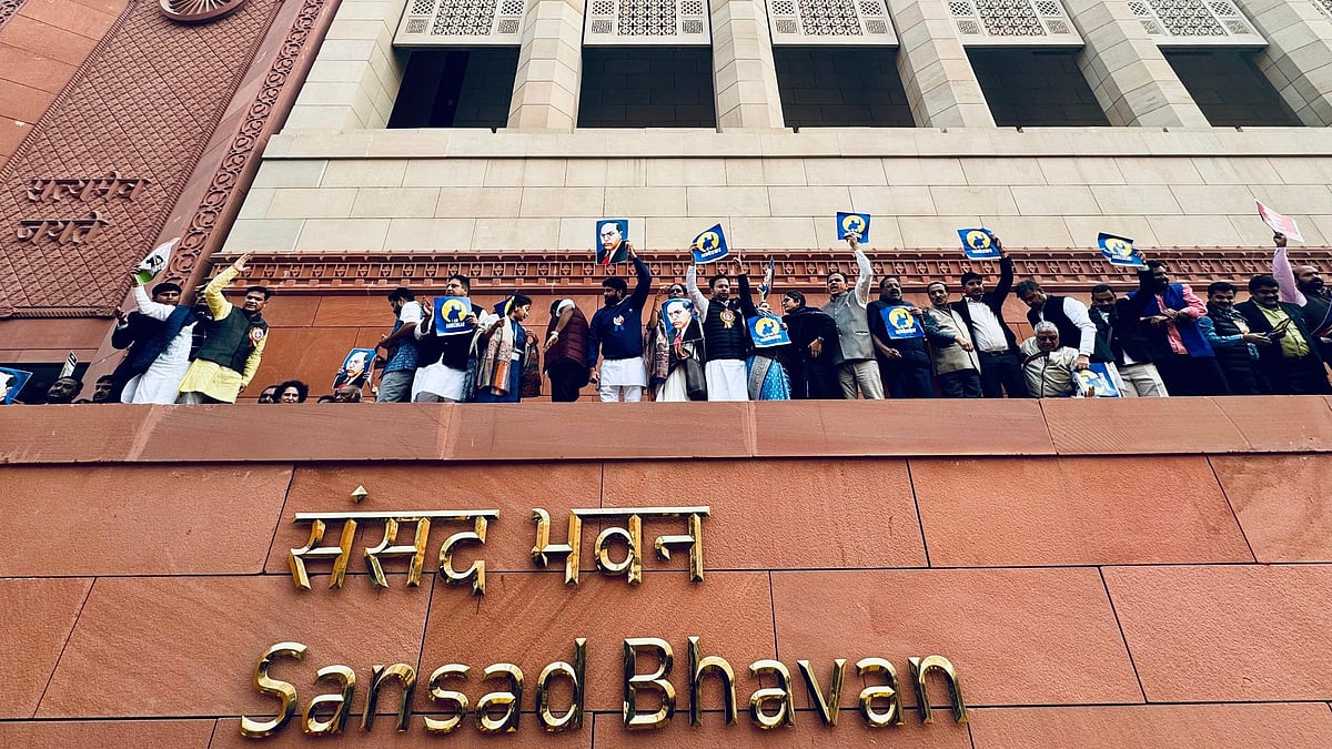 PTI : MPs protesting outside parliament building on Thursday