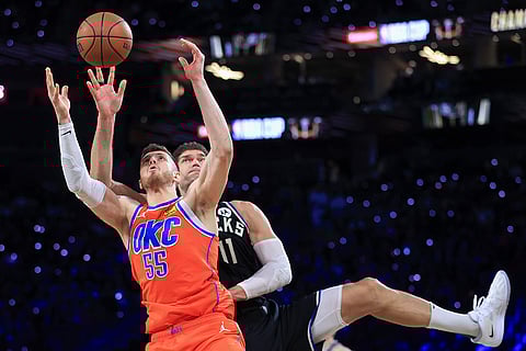 NBA Cup Final: Thunder center Isaiah Hartenstein (55) and Bucks center Brook Lopez (11) contest for a rebound