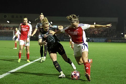 Women's Champions League: Arsenal's Katie McCabe, right vies for the ball with Bayern Munich's Linda Dallmann