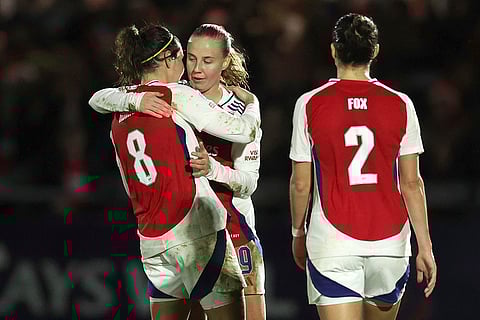Women's Champions League: Arsenal's Mariona Caldentey is hugged by Leah Williamson after the end of the match