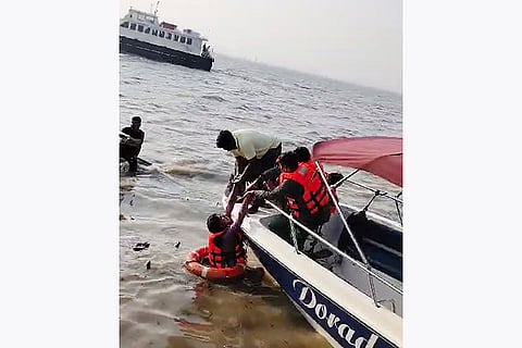 Passengers being rescued following a ferry accident