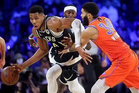 NBA Cup Final: Bucks forward Giannis Antetokounmpo (34) drives against Thunder forward Kenrich Williams
